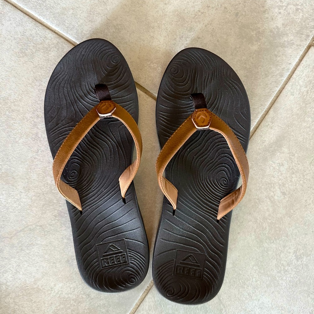 Reef brown flip flops